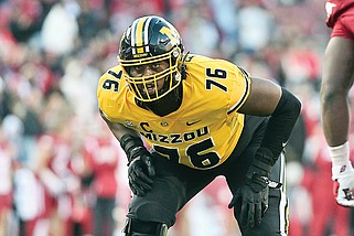 In this Nov. 24, 2023, file photo, Missouri offensive lineman Javon Foster lines up during a game against Arkansas in Fayetteville, Ark. Foster was selected by the Jaguars on Saturday in the fourth round of the NFL Draft. (Associated Press)